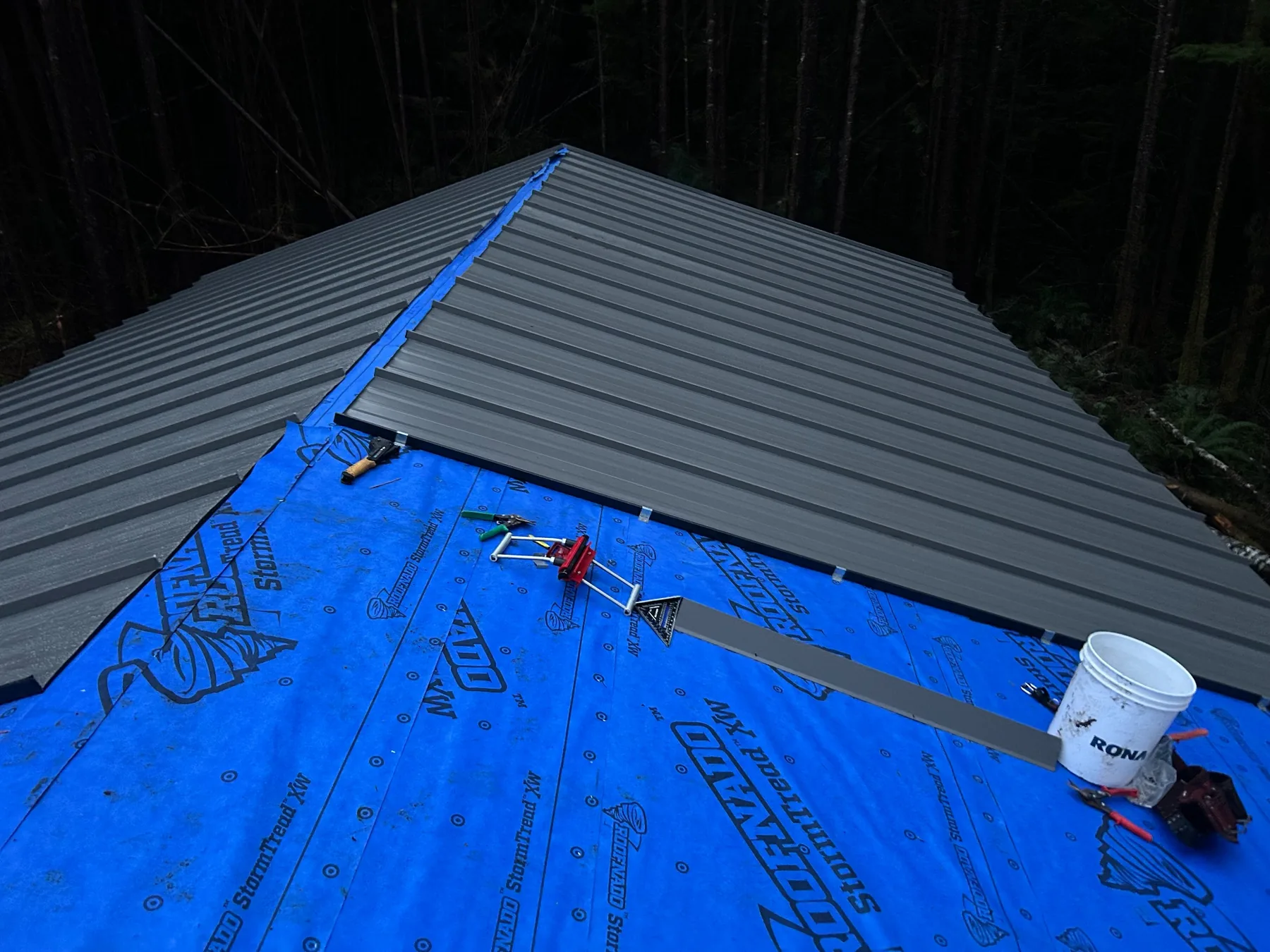 Metal roof installation in progress