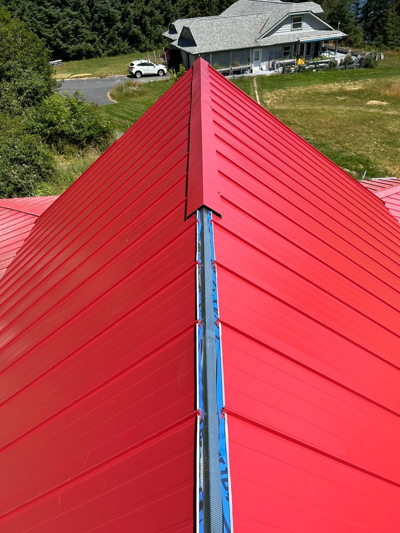 Red metal roof ridge detail