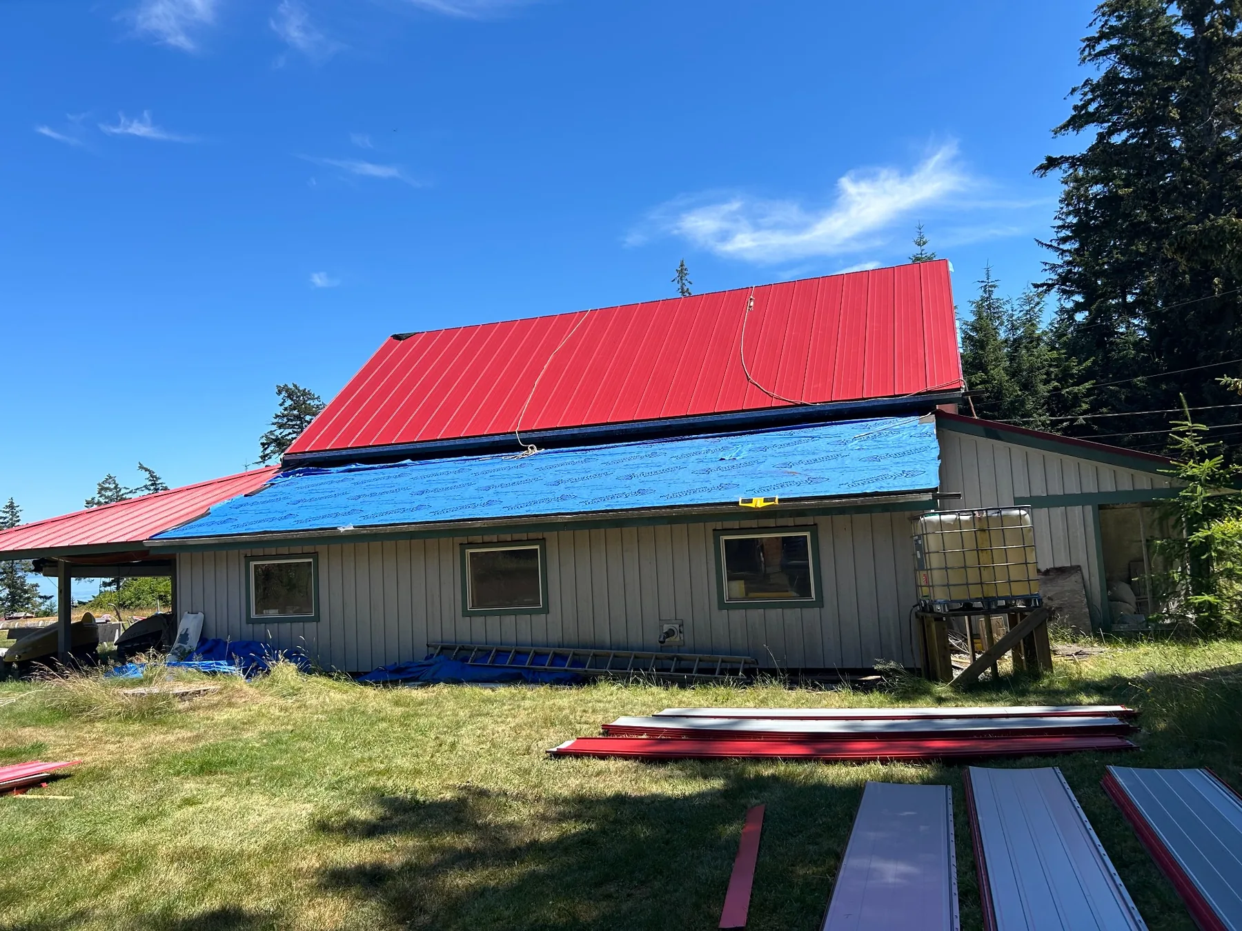 Red metal roofing installation