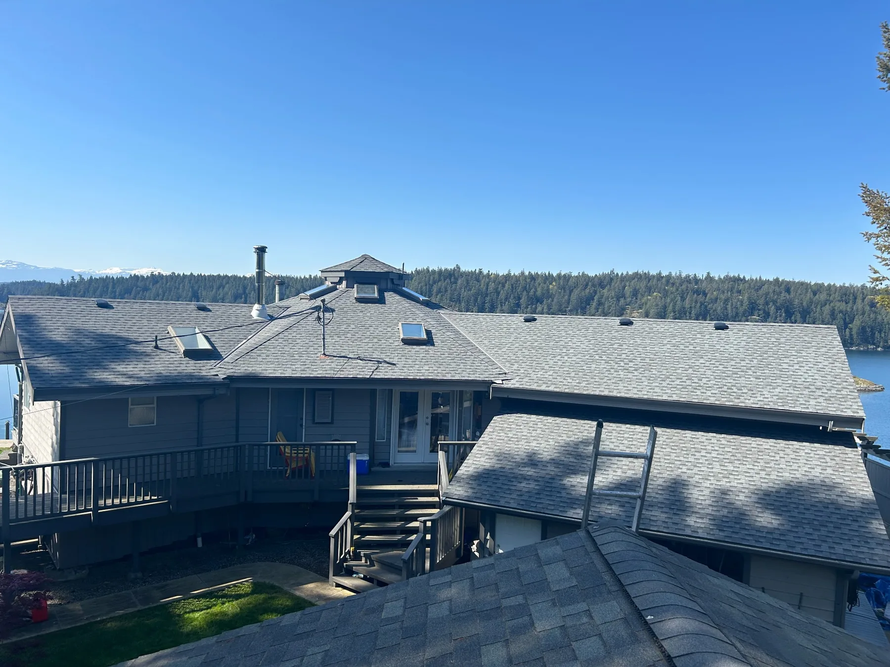 Finished waterfront asphalt shingle roofing project